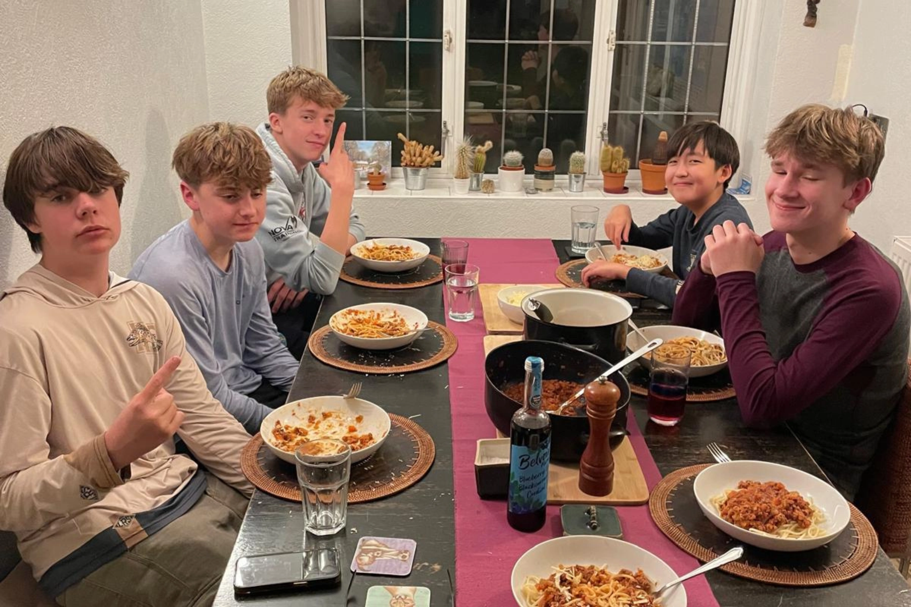 Team bonding off the river, sharing a meal after a challenging but rewarding day.